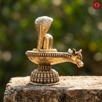 Brass Shivling with Detachable Sheshnaag – 6cm | Golden Finish | Spiritual Idol for Temple & Home Decor