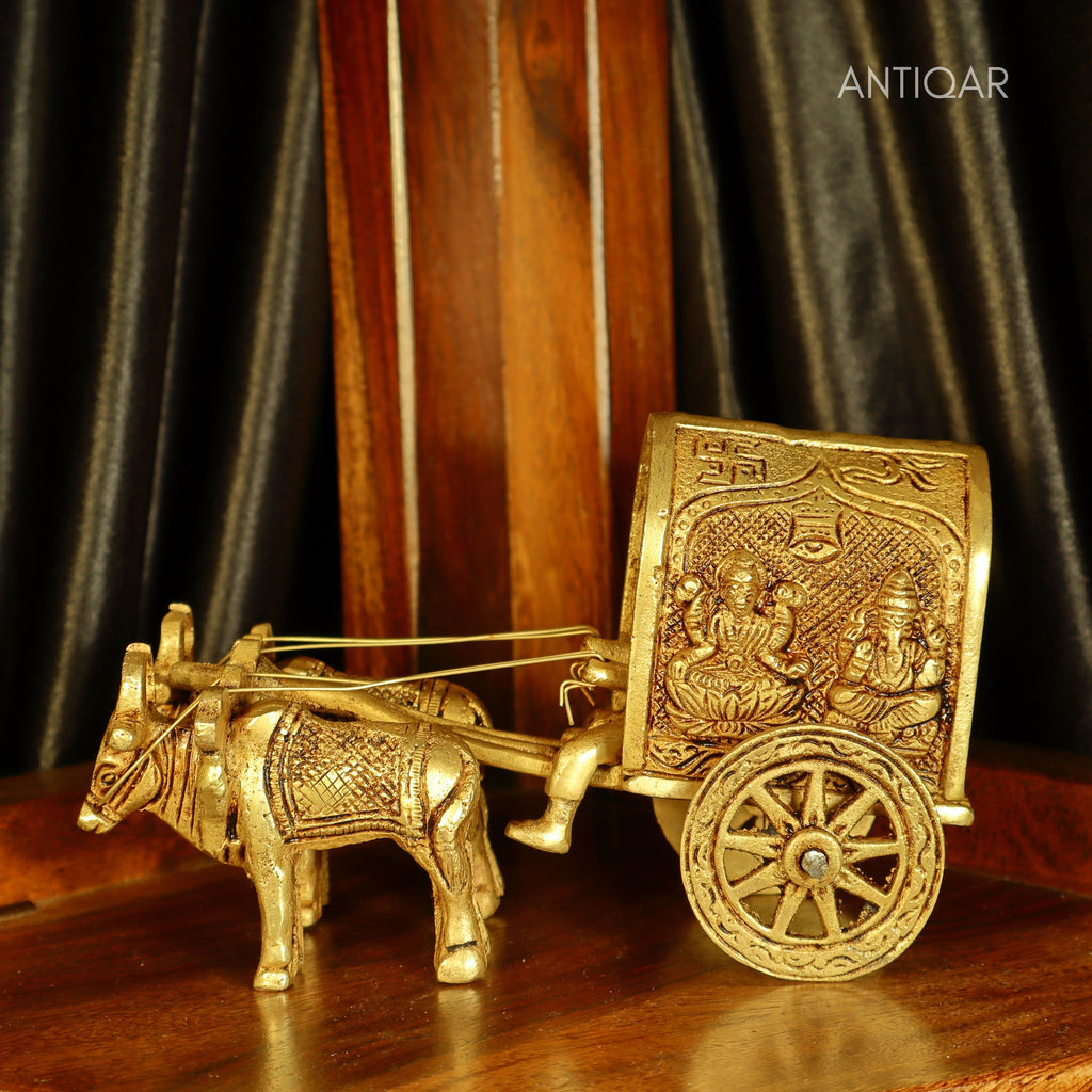 Brass Bullock Cart Showpiece – 10 cm | With Lakshmi & Ganesh Carving on Sides | Antique Golden Finish | Handcrafted Decor for Temple, Home & Festival Use
