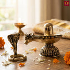 Brass Shivling with Detachable Sheshnaag – 8cm | Golden Finish | Spiritual Idol for Temple & Home Decor