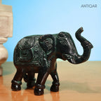 Brass Elephant Showpiece – 9 cm | Walking Pose with Upward Trunk & Carved Body | Black Green Patina Finish | Handcrafted Decor for Temple, Home & Table