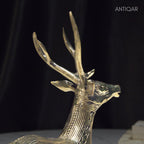 Dhokra Art Brass Deer – 17.5 cm | Sitting Pose in Antique Finish | Tribal Handcrafted Showpiece for Temple, Home & Table Decor