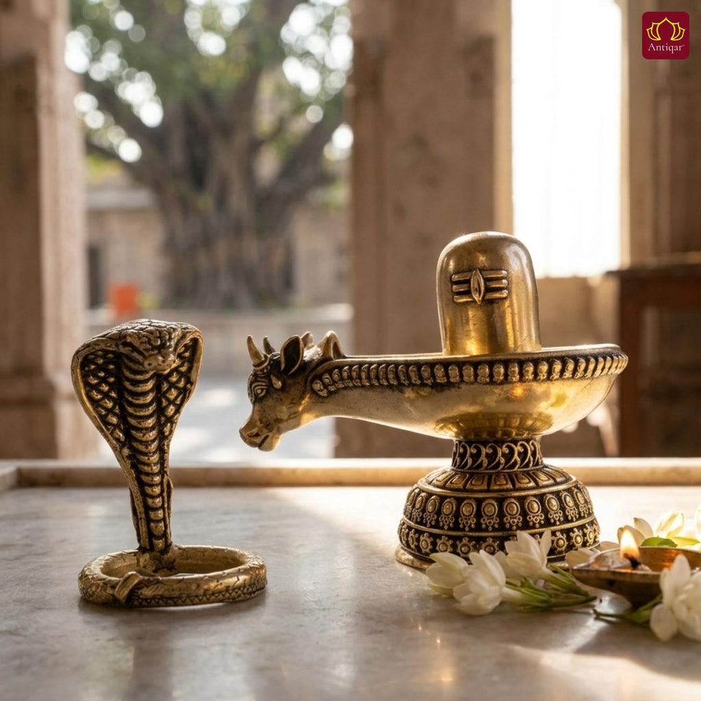 Brass Shivling with Detachable Sheshnaag – 6cm | Golden Finish | Spiritual Idol for Temple & Home Decor