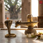 Brass Shivling with Detachable Sheshnaag – 6cm | Golden Finish | Spiritual Idol for Temple & Home Decor