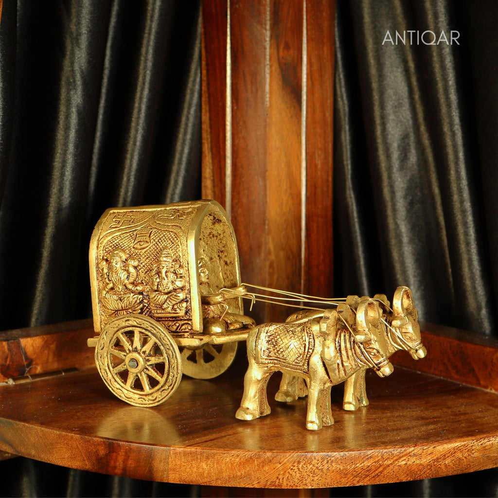 Brass Bullock Cart Showpiece – 10 cm | With Lakshmi & Ganesh Carving on Sides | Antique Golden Finish | Handcrafted Decor for Temple, Home & Festival Use