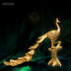 Brass Peacock Showpiece – 21 cm | Sitting on Tree Trunk Design | Antique Golden Finish | Handcrafted Decor for Temple, Home & Table