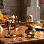 Brass Shivling with Detachable Sheshnaag – 6cm | Golden Finish | Spiritual Idol for Temple & Home Decor