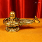 Brass Shivling with Detachable Sheshnaag –6 cm | Antique Finish | Spiritual Idol for Temple & Home Decor
