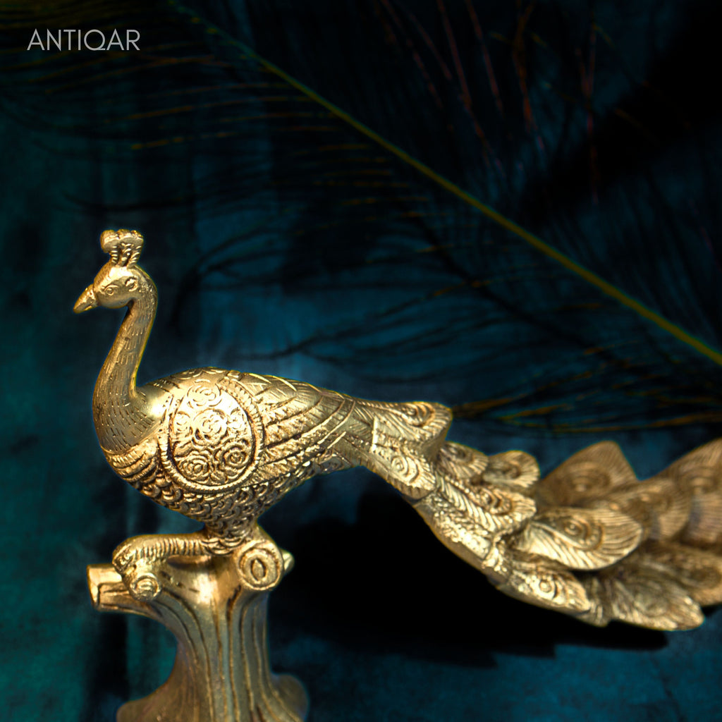 Brass Peacock Showpiece – 21 cm | Sitting on Tree Trunk Design | Antique Golden Finish | Handcrafted Decor for Temple, Home & Table