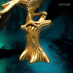 Brass Peacock Showpiece – 21 cm | Sitting on Tree Trunk Design | Antique Golden Finish | Handcrafted Decor for Temple, Home & Table