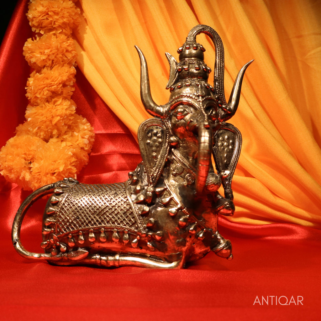 Dhokra Art Brass Nandi – 22 cm | Sitting Pose with Ganesha Face & Trishul on Head | Antique Finish Tribal Handcrafted Showpiece for Temple, Home & Table Decor