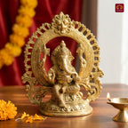 Brass Ganesh Ji Idol with Ornate Frame – 22 cm | Sitting Position with Intricate Carving | Antique Golden Finish | Handcrafted for Temple, Home & Table Decor