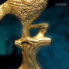 Brass Peacock Showpiece – 21 cm | Sitting on Tree Trunk Design | Antique Golden Finish | Handcrafted Decor for Temple, Home & Table