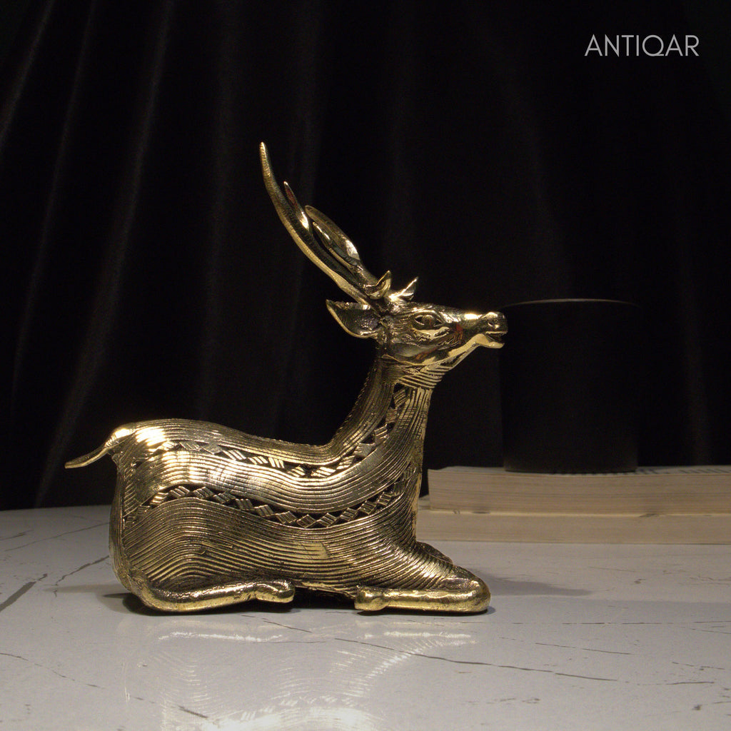 Dhokra Art Brass Deer – 17.5 cm | Sitting Pose in Antique Finish | Tribal Handcrafted Showpiece for Temple, Home & Table Decor