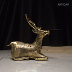 Dhokra Art Brass Deer – 17.5 cm | Sitting Pose in Antique Finish | Tribal Handcrafted Showpiece for Temple, Home & Table Decor