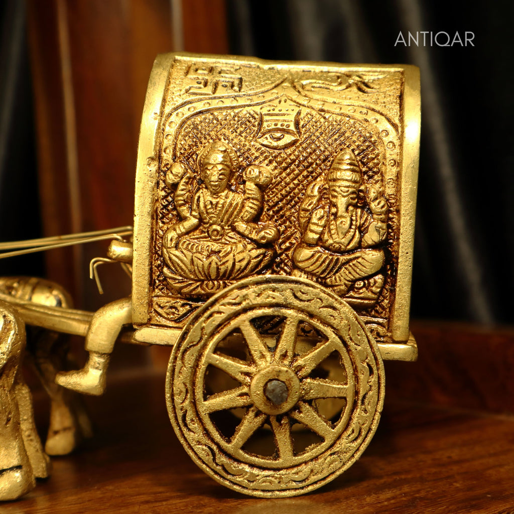 Brass Bullock Cart Showpiece – 10 cm | With Lakshmi & Ganesh Carving on Sides | Antique Golden Finish | Handcrafted Decor for Temple, Home & Festival Use
