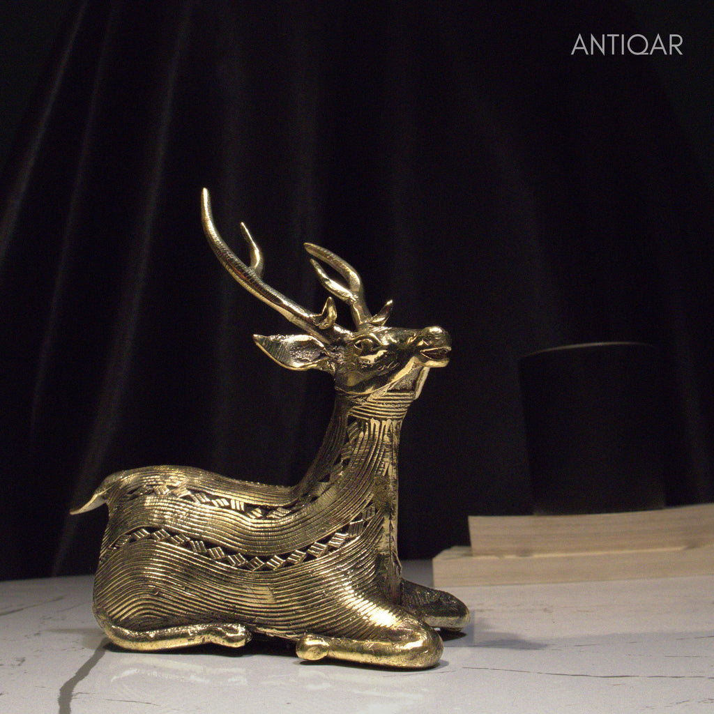 Dhokra Art Brass Deer – 17.5 cm | Sitting Pose in Antique Finish | Tribal Handcrafted Showpiece for Temple, Home & Table Decor