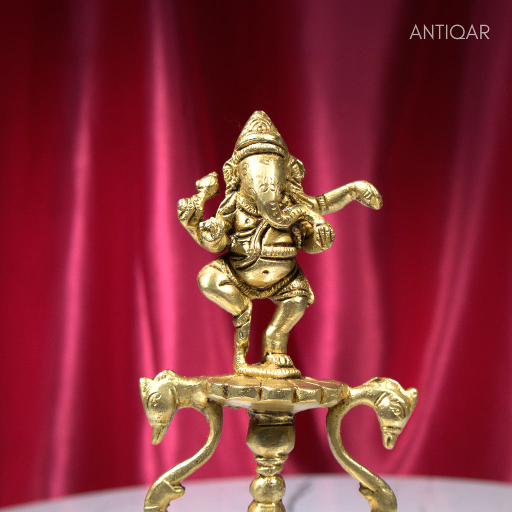 Brass Aarti Diya – 21 cm | Twin Peacock Design with Dancing Ganesha on Top | Antique Golden Finish | Handcrafted for Temple, Home & Religious Decor