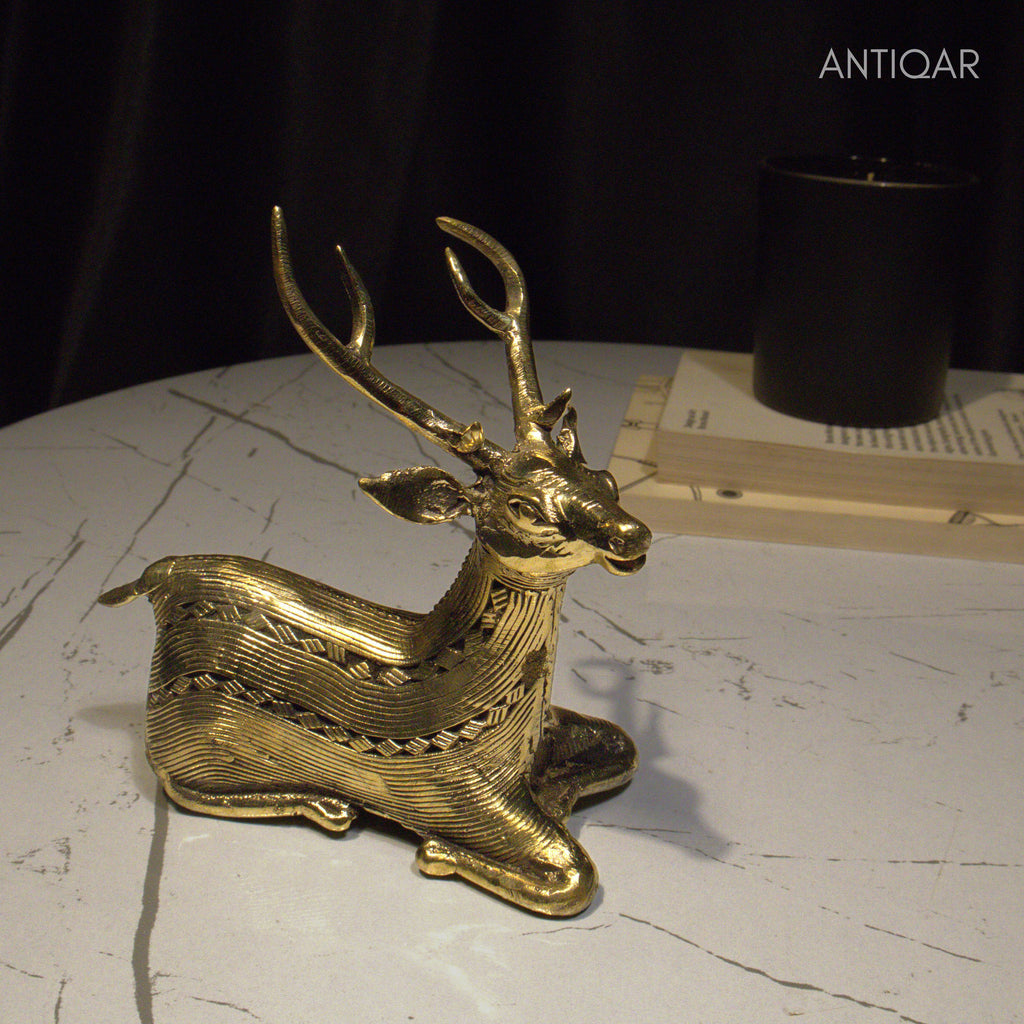 Dhokra Art Brass Deer – 17.5 cm | Sitting Pose in Antique Finish | Tribal Handcrafted Showpiece for Temple, Home & Table Decor