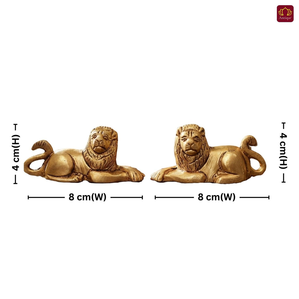 Brass Lion Pair Showpiece – 4 cm | Sitting Position | Antique Golden Finish | Handcrafted Figurines for Home, Table & Vastu Decor