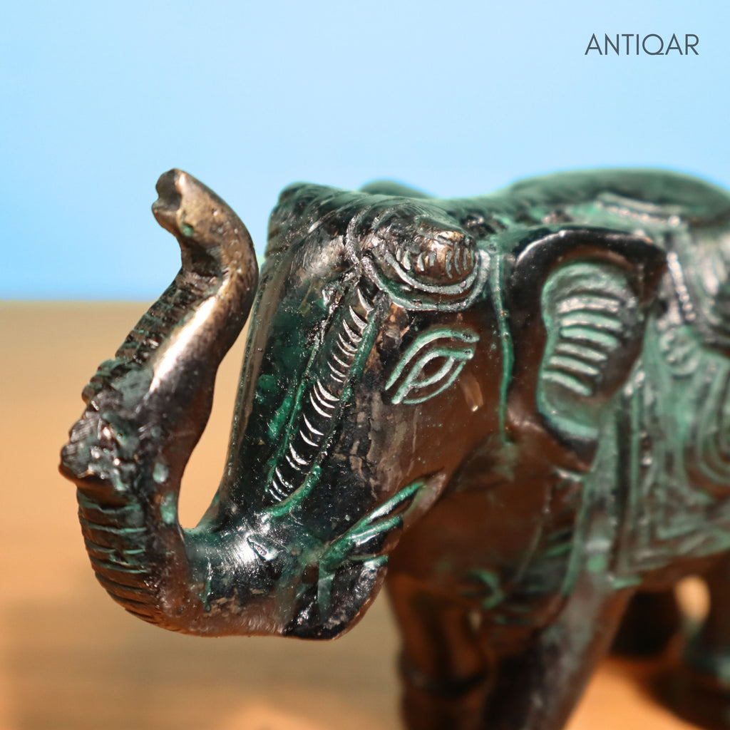 Brass Elephant Showpiece – 9 cm | Walking Pose with Upward Trunk & Carved Body | Black Green Patina Finish | Handcrafted Decor for Temple, Home & Table