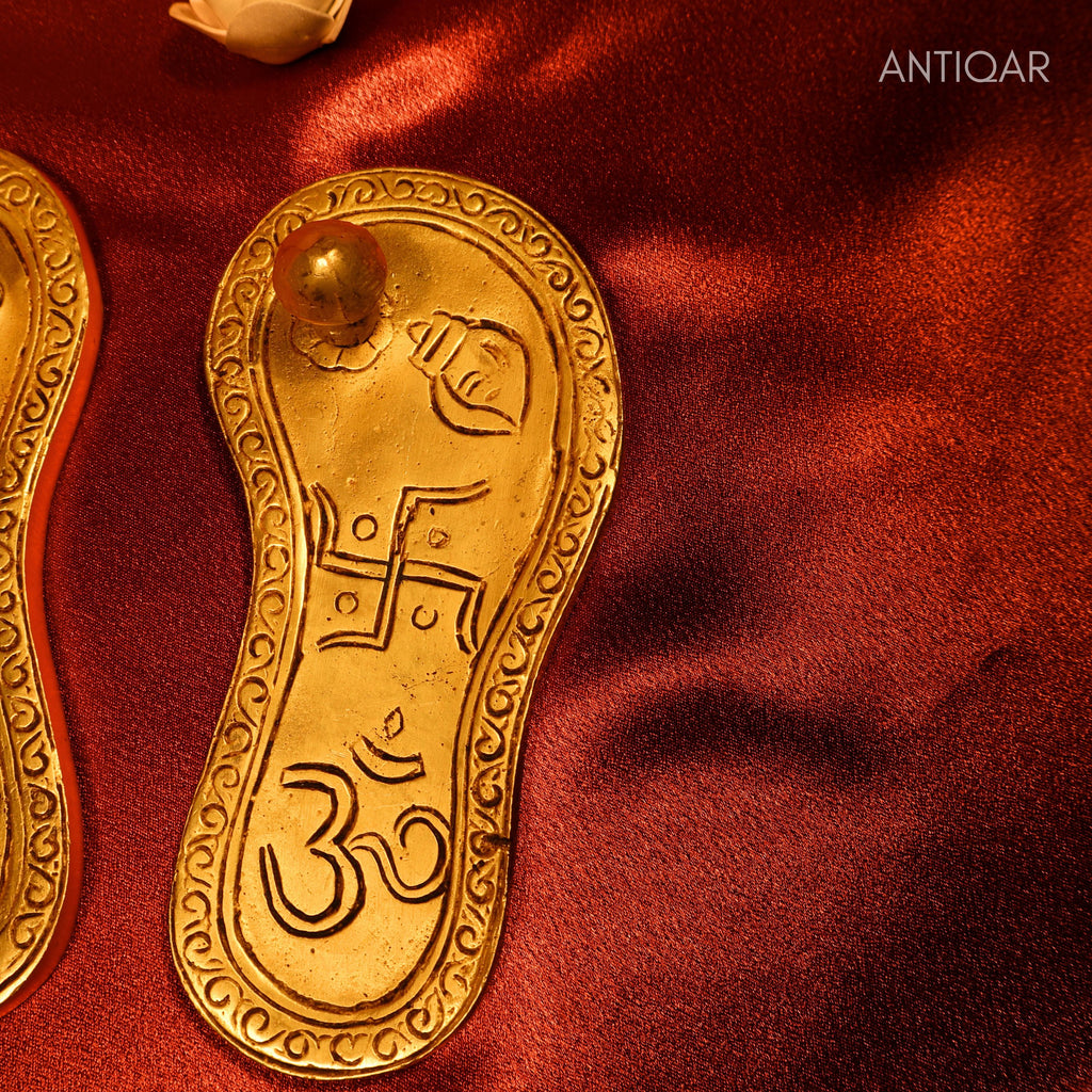 Brass Charan Paduka – 4 cm | With Om & Swastik Carving | Antique Golden Finish | Handcrafted Spiritual Symbol for Temple & Home Decor