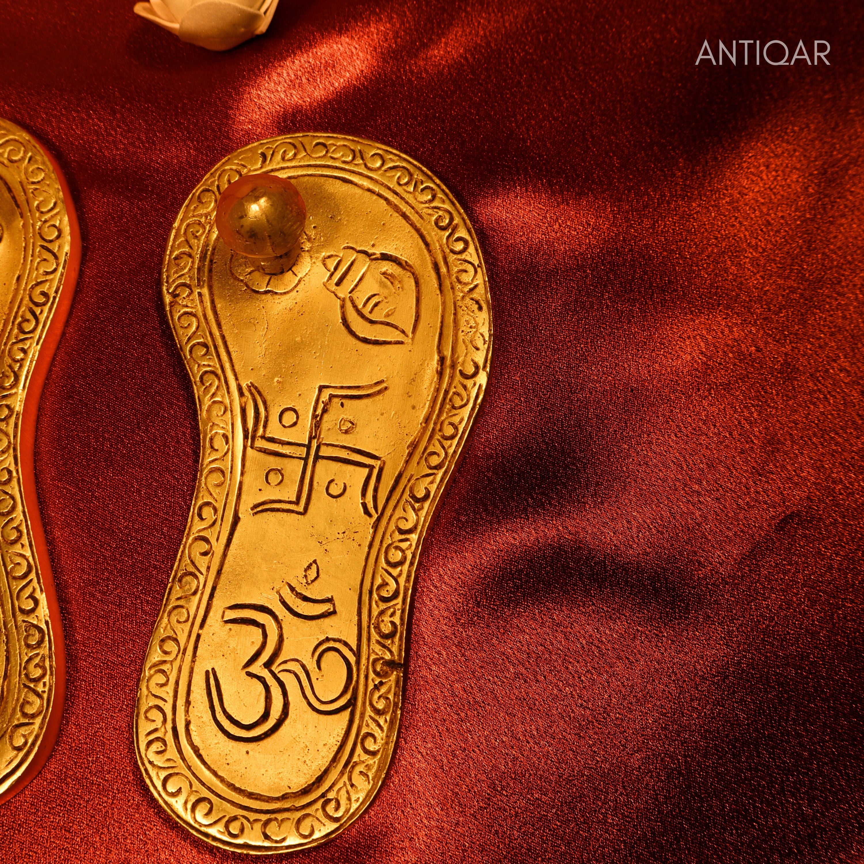 Brass Charan Paduka – 4 cm | With Om & Swastik Carving | Antique Golden Finish | Handcrafted Spiritual Symbol for Temple & Home Decor