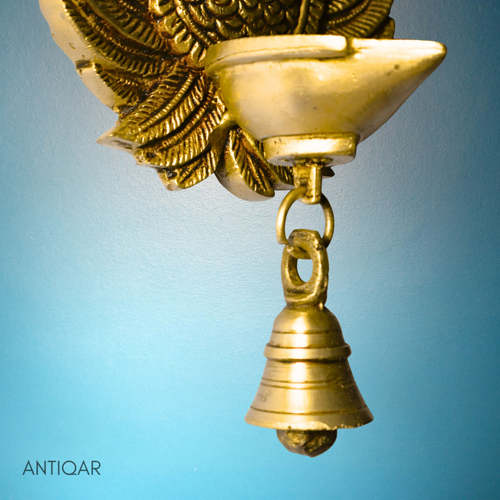 Brass Dancing Peacock Wall Hanging Diya – 23 cm | With One Bell & Intricate Carving | Antique Golden Finish | Handcrafted Decor for Temple, Home & Wall