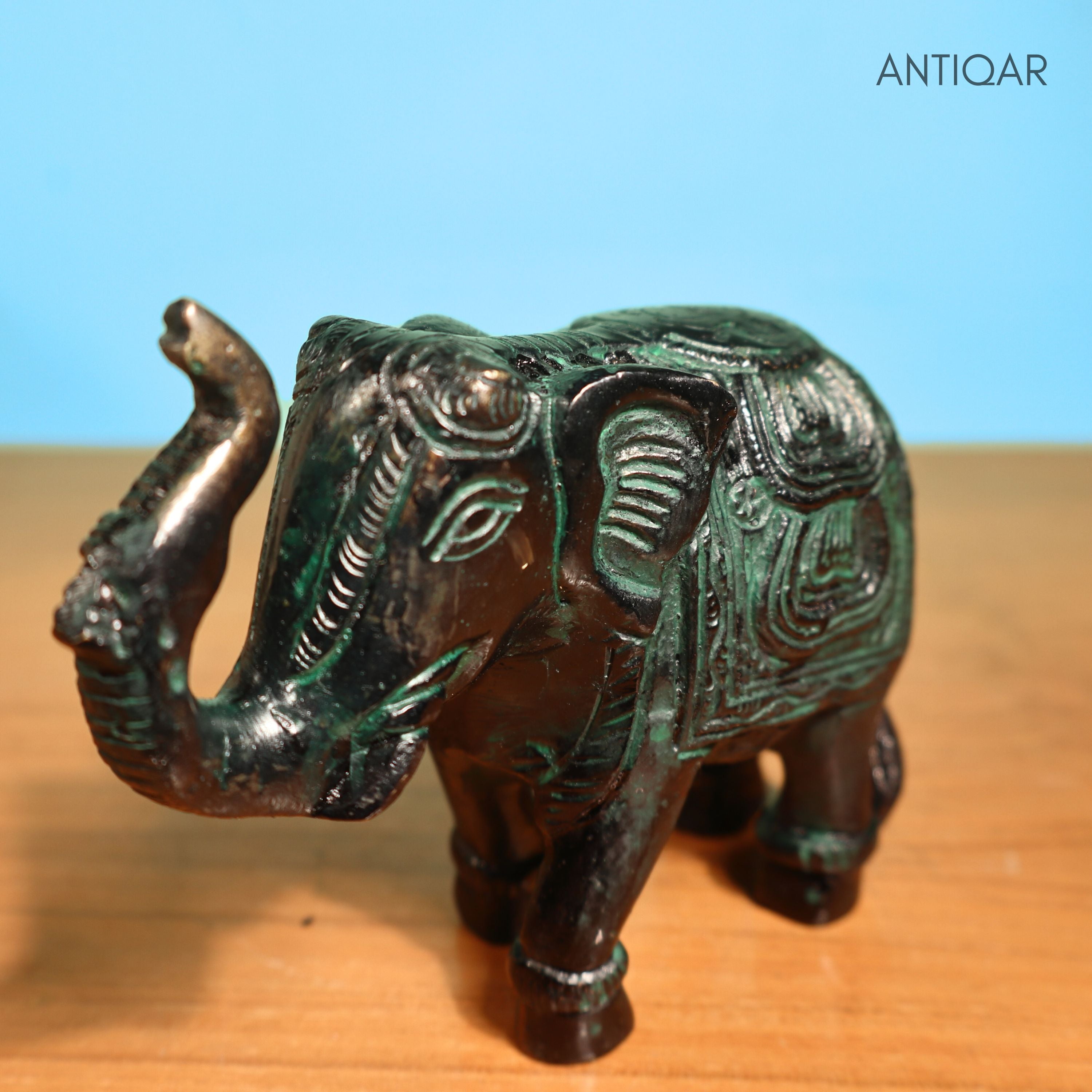 Brass Elephant Showpiece – 9 cm | Walking Pose with Upward Trunk & Carved Body | Black Green Patina Finish | Handcrafted Decor for Temple, Home & Table