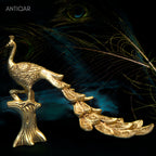 Brass Peacock Showpiece – 21 cm | Sitting on Tree Trunk Design | Antique Golden Finish | Handcrafted Decor for Temple, Home & Table
