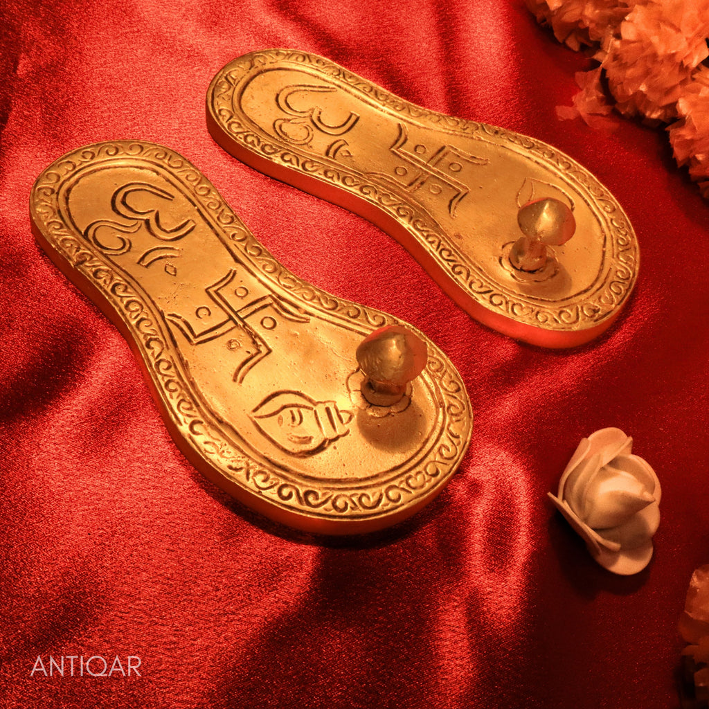 Brass Charan Paduka – 4 cm | With Om & Swastik Carving | Antique Golden Finish | Handcrafted Spiritual Symbol for Temple & Home Decor