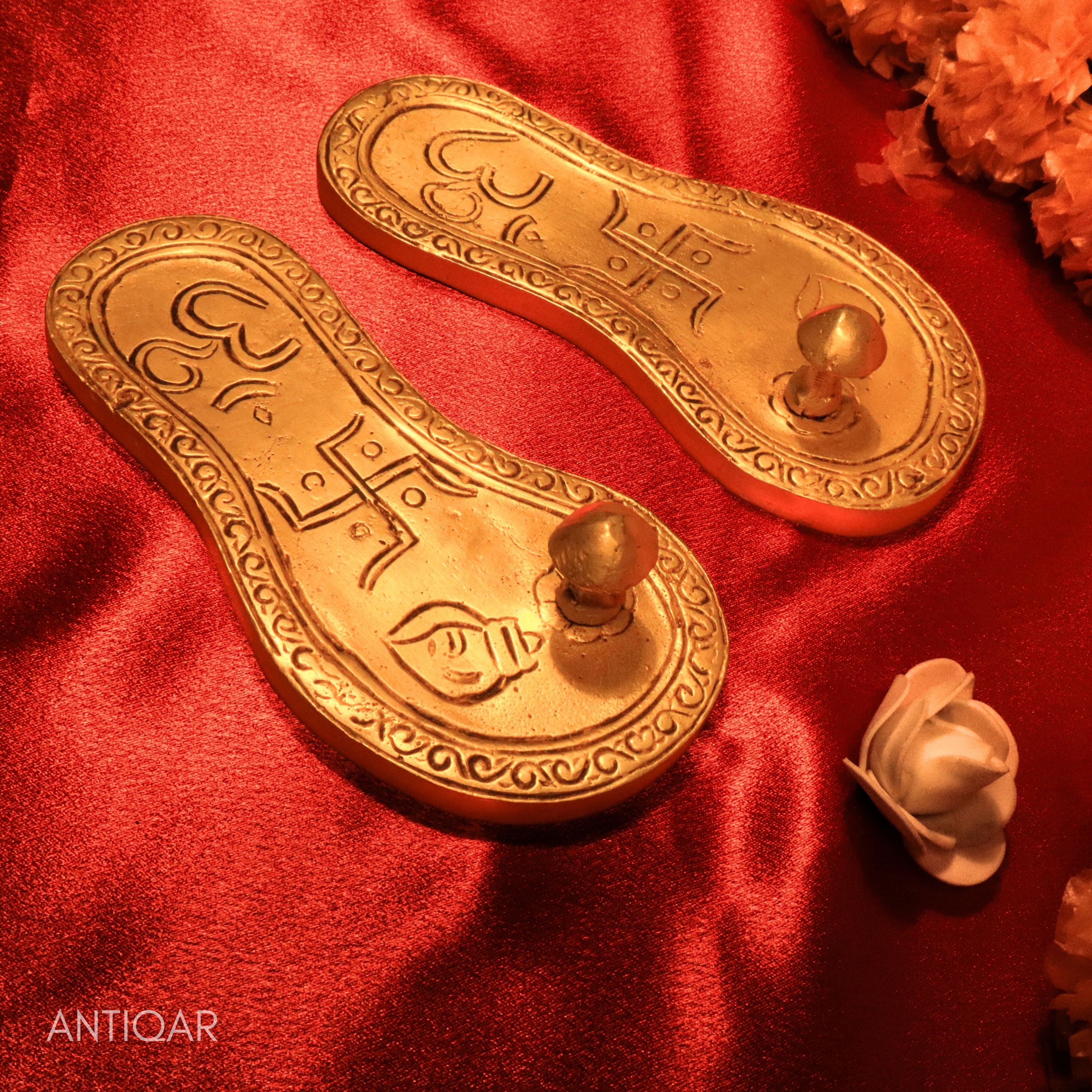Brass Charan Paduka – 4 cm | With Om & Swastik Carving | Antique Golden Finish | Handcrafted Spiritual Symbol for Temple & Home Decor