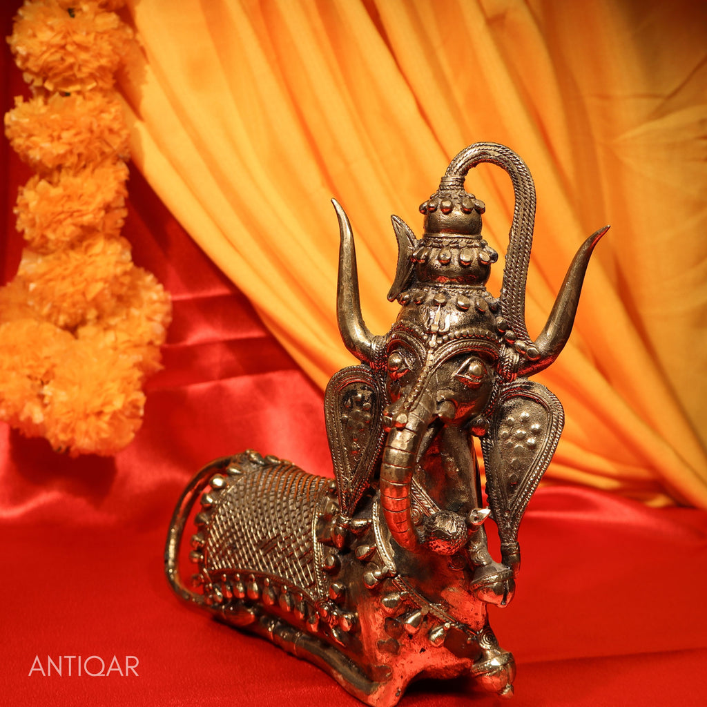 Dhokra Art Brass Nandi – 22 cm | Sitting Pose with Ganesha Face & Trishul on Head | Antique Finish Tribal Handcrafted Showpiece for Temple, Home & Table Decor