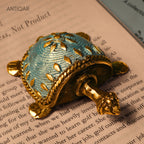 Dhokra Art Brass Turtle – 3 cm | Sky Blue Antique Finish | Tribal Handcrafted Showpiece for Temple, Home & Table Decor
