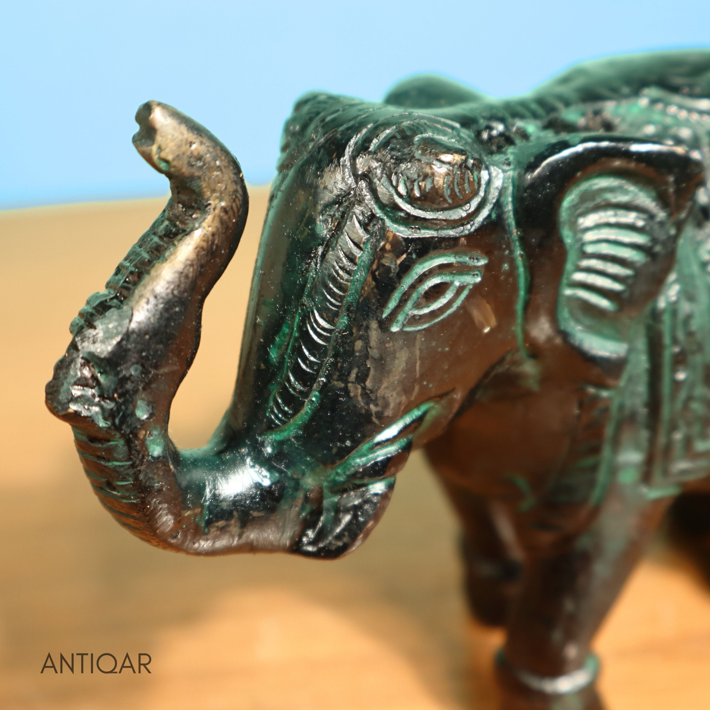 Brass Elephant Showpiece – 9 cm | Walking Pose with Upward Trunk & Carved Body | Black Green Patina Finish | Handcrafted Decor for Temple, Home & Table