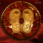 Brass Charan Paduka – 4 cm | With Om & Swastik Carving | Antique Golden Finish | Handcrafted Spiritual Symbol for Temple & Home Decor