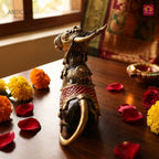 Dhokra Art Brass Nandi – 11 cm | Sitting Position with Brown & Red Antique Finish | Tribal Handcrafted Showpiece for Temple, Home & Table Decor