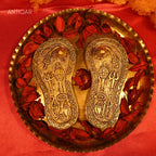 Brass Charan Paduka Pair – 3 cm | With Carved Talwar, Dhanush, Trishul & Chakra | Antique Golden Finish | Handcrafted Spiritual Decor for Temple, Home & Festival Use