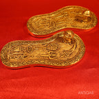 Brass Charan Paduka Pair – 3 cm | With Carved Talwar, Dhanush, Trishul & Chakra | Antique Golden Finish | Handcrafted Spiritual Decor for Temple, Home & Festival Use